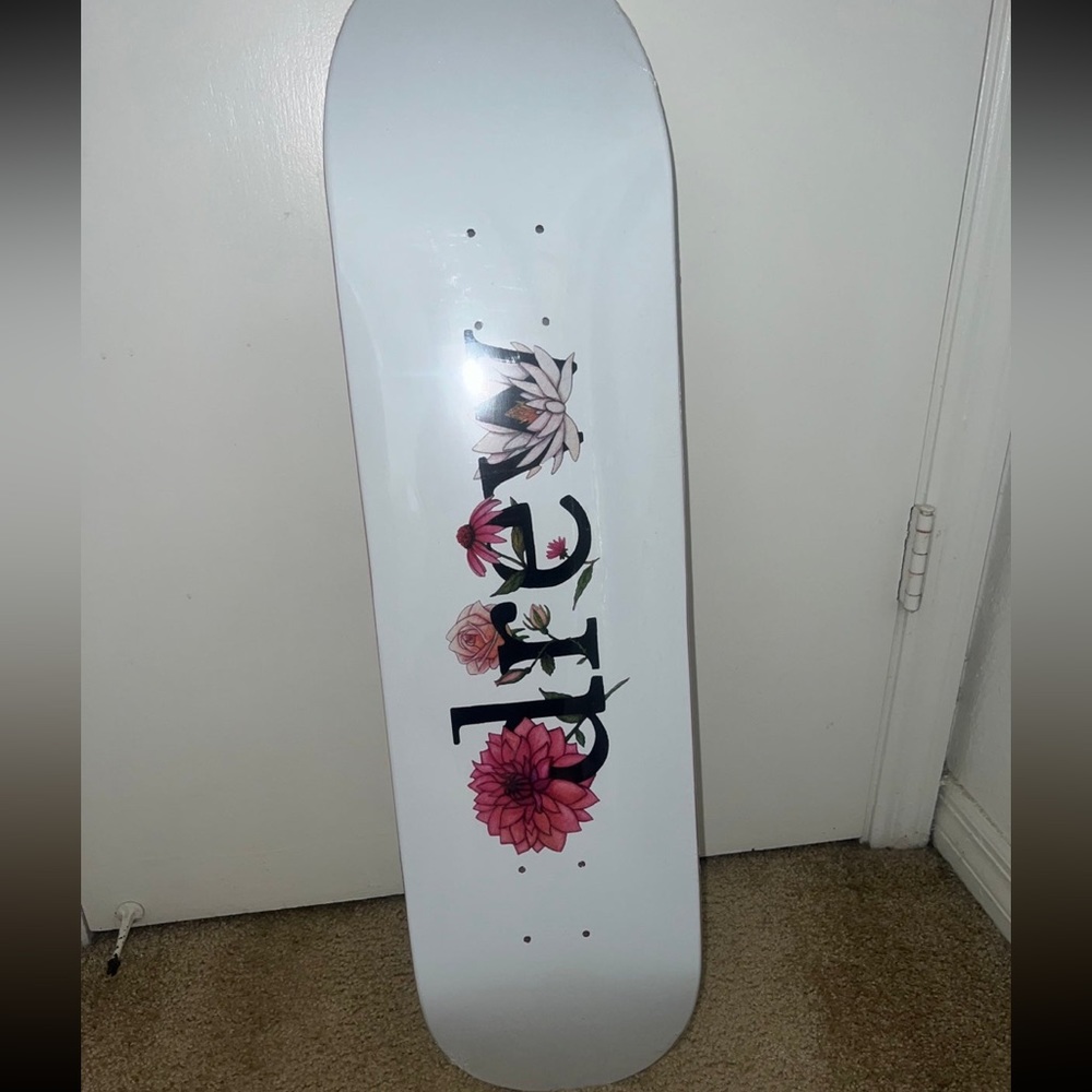 Drew House flower skateboard